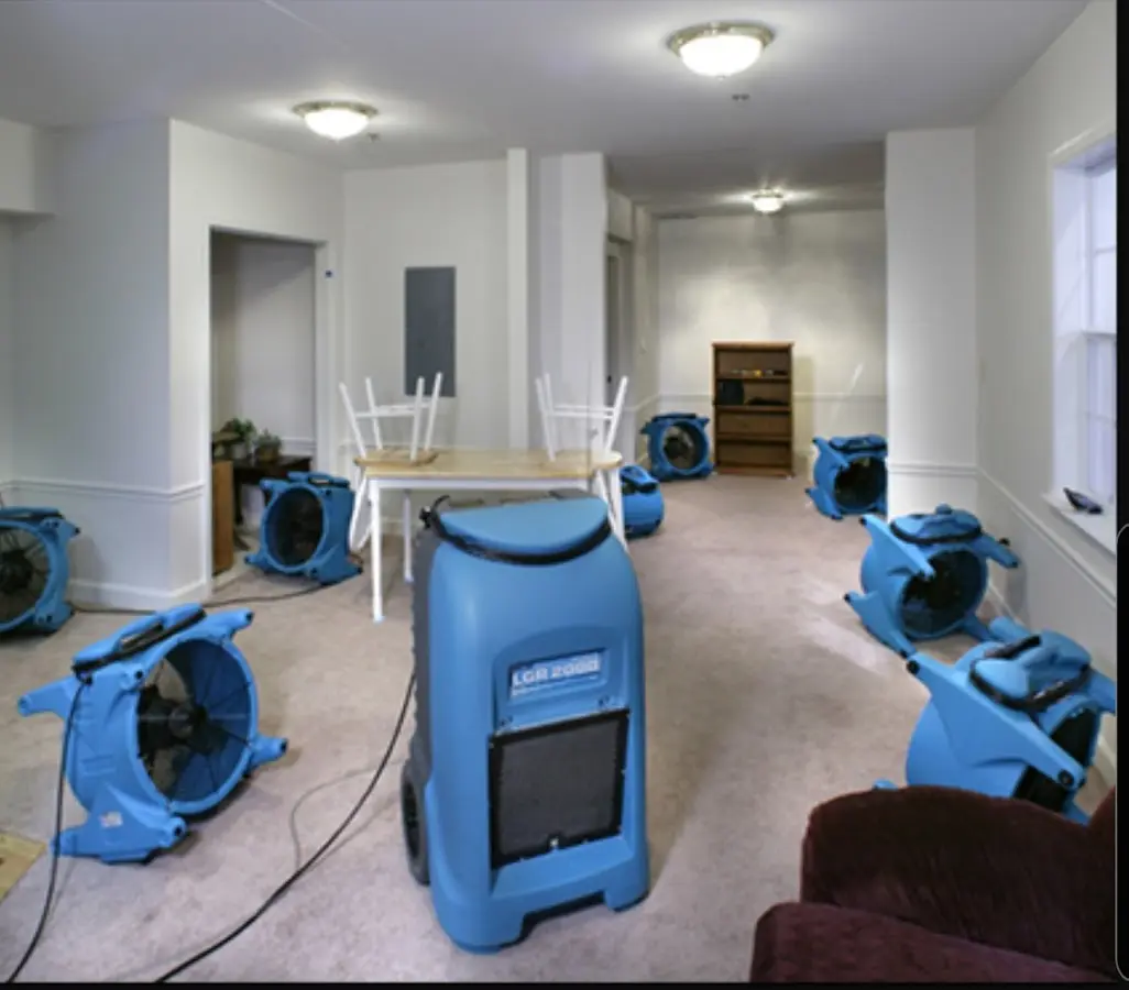 Air movers and dehumidifier setup for Water Damage Restoration in Scriba